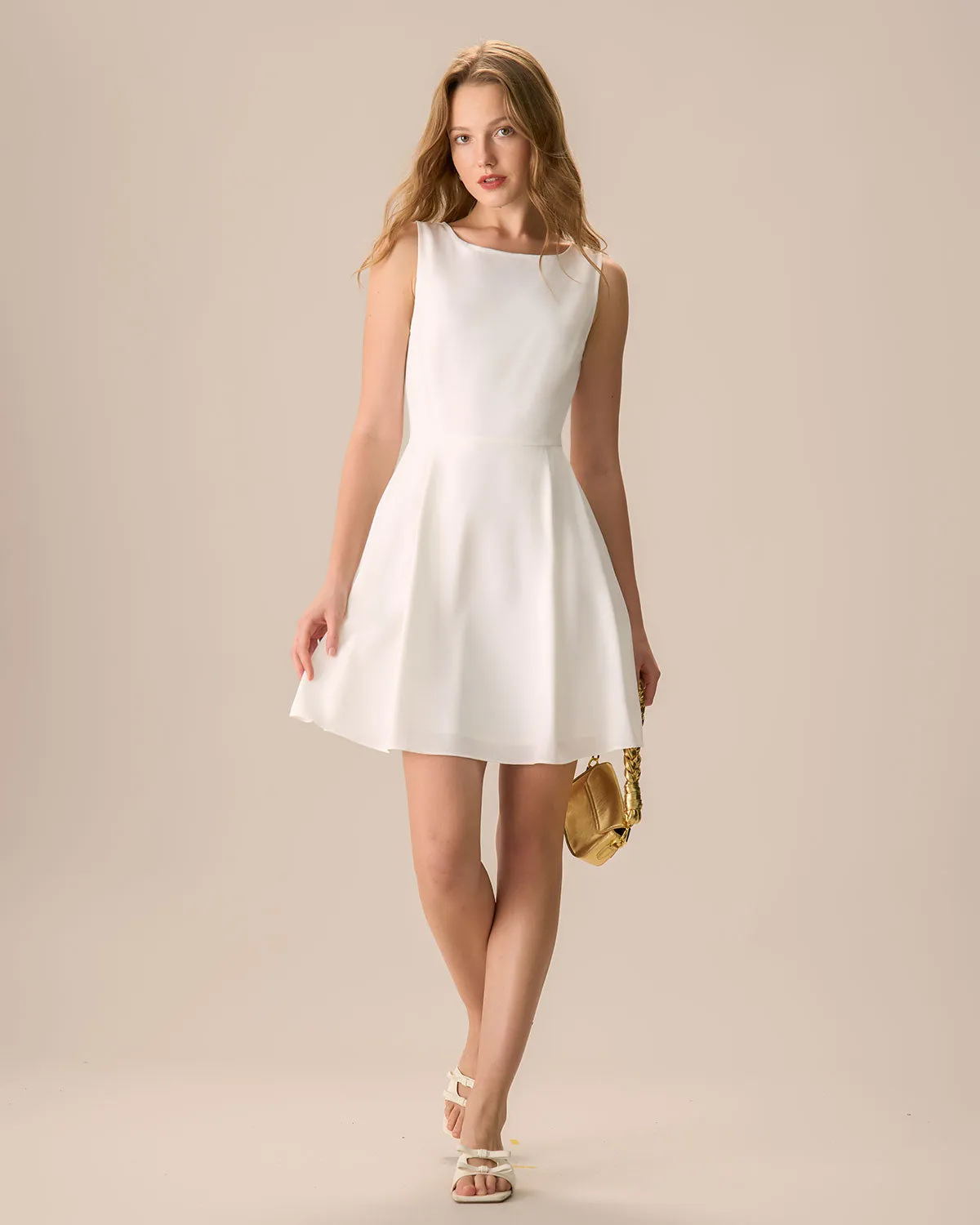 The White Round Neck Pleated Mini Dress